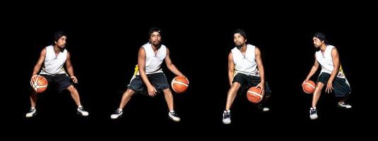 Gesture of Asian basketball player dribbling on black background. Basketball concept in Asia photo