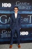 los angeles, 10 de abril - isaac hempstead wright en el estreno de la temporada 6 de game of thrones en el teatro chino tcl imax el 10 de abril de 2016 en los angeles, ca foto