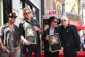 LOS ANGELES, SEP 2 -  Dave Stewart, Daryl Hall, John Oates, Jerry Greenberg at the Hall and Oates Hollywood Walk of Fame Star Ceremony on Hollywood Boulevard on September 2, 2016 in Los Angeles, CA photo