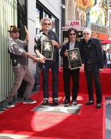 LOS ANGELES, SEP 2 -  Dave Stewart, Daryl Hall, John Oates, Jerry Greenberg at the Hall and Oates Hollywood Walk of Fame Star Ceremony on Hollywood Boulevard on September 2, 2016 in Los Angeles, CA photo