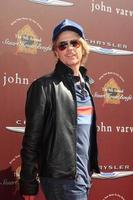 LOS ANGELES, MAR 11 -  David Spade arrives at the 9th Annual John Varvatos Stuart House Benefit at the John Varvatos Store on March 11, 2012 in West Hollywood, CA photo