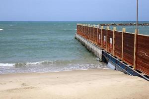 Fence in a city park on the Mediterranean Sea in Israel photo