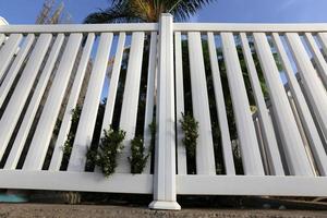 Fence in a city park on the Mediterranean Sea in Israel photo