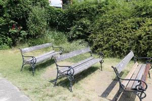 Bench for rest in a city park on the shores of the Mediterranean Sea. photo