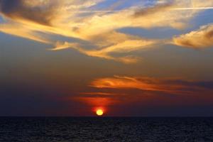 Colorful sunset at the end of the day. photo
