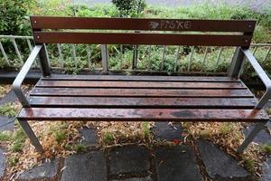 Bench for rest in a city park on the shores of the Mediterranean Sea. photo