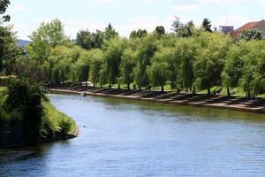 The Ljubljanica River flows through the capital of Slovenia, the city of Ljubljana. photo