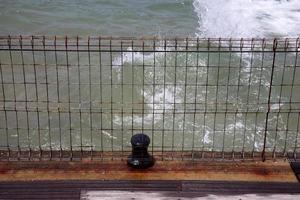 Fence in a city park on the Mediterranean Sea in Israel photo