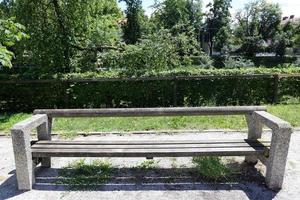 Bench for rest in a city park on the shores of the Mediterranean Sea. photo