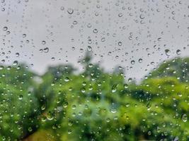 Rain drop on glass window. photo