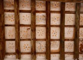 Wood paneling with flower drawings photo