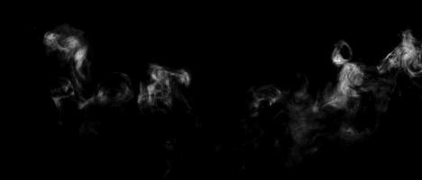 Abstract powder or smoke isolated on black background photo