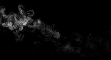 Abstract powder or smoke isolated on black background photo