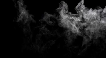 Abstract powder or smoke isolated on black background photo