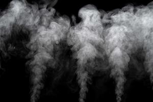 Abstract powder or smoke isolated on black background photo