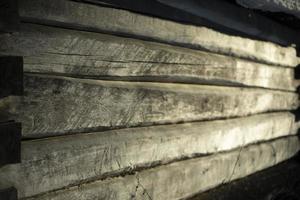 Wooden wall. Log house. Dry wood texture. photo