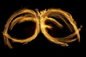 Fire on black background. Lines of flame. Fuel combustion. photo