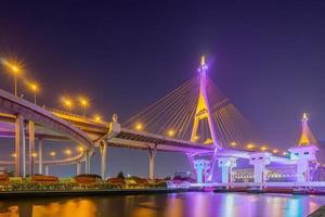 Light up on the Bhumibol highway bridge across the Chao Phraya river in Samut Prakan, Thailand photo
