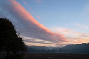 Landscape with pastel-colored clouds photo