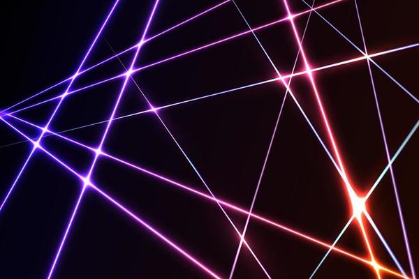 Intersecting glowing laser  security  beams on a dark background.Art design shine light ray.Laser field.