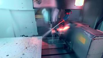 CNC machine in metalworking industry. laser cutting in steel. modern industrial equipment. Technological process close-up. Machining spindle on lathe. Metalworking. Turner works on the machine. video