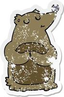 distressed sticker of a cartoon bear vector