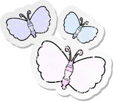 distressed sticker of a cartoon butterflies vector