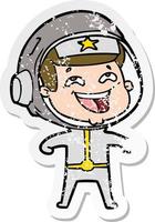 distressed sticker of a cartoon laughing astronaut vector