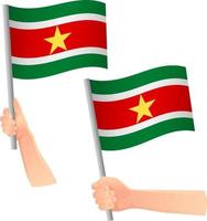 Suriname flag in hand icon vector