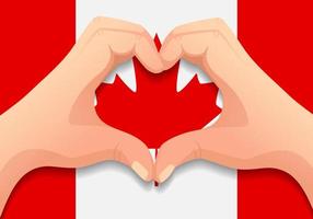 bandera de Canadá y forma de corazón de mano vector