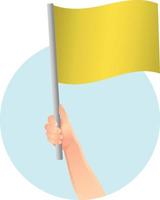 yellow flag in hand icon vector