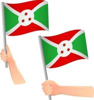 icono de la bandera de Burundi en la mano vector