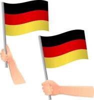 icono de la bandera de Alemania en la mano vector