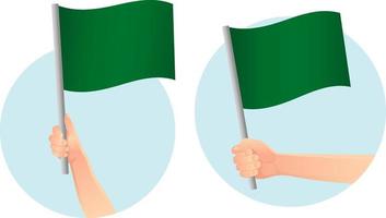 icono de bandera verde en la mano vector