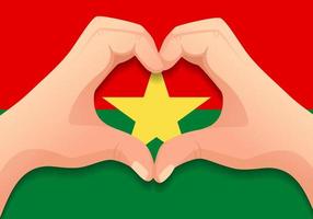 bandera de burkina faso y forma de corazón de mano vector