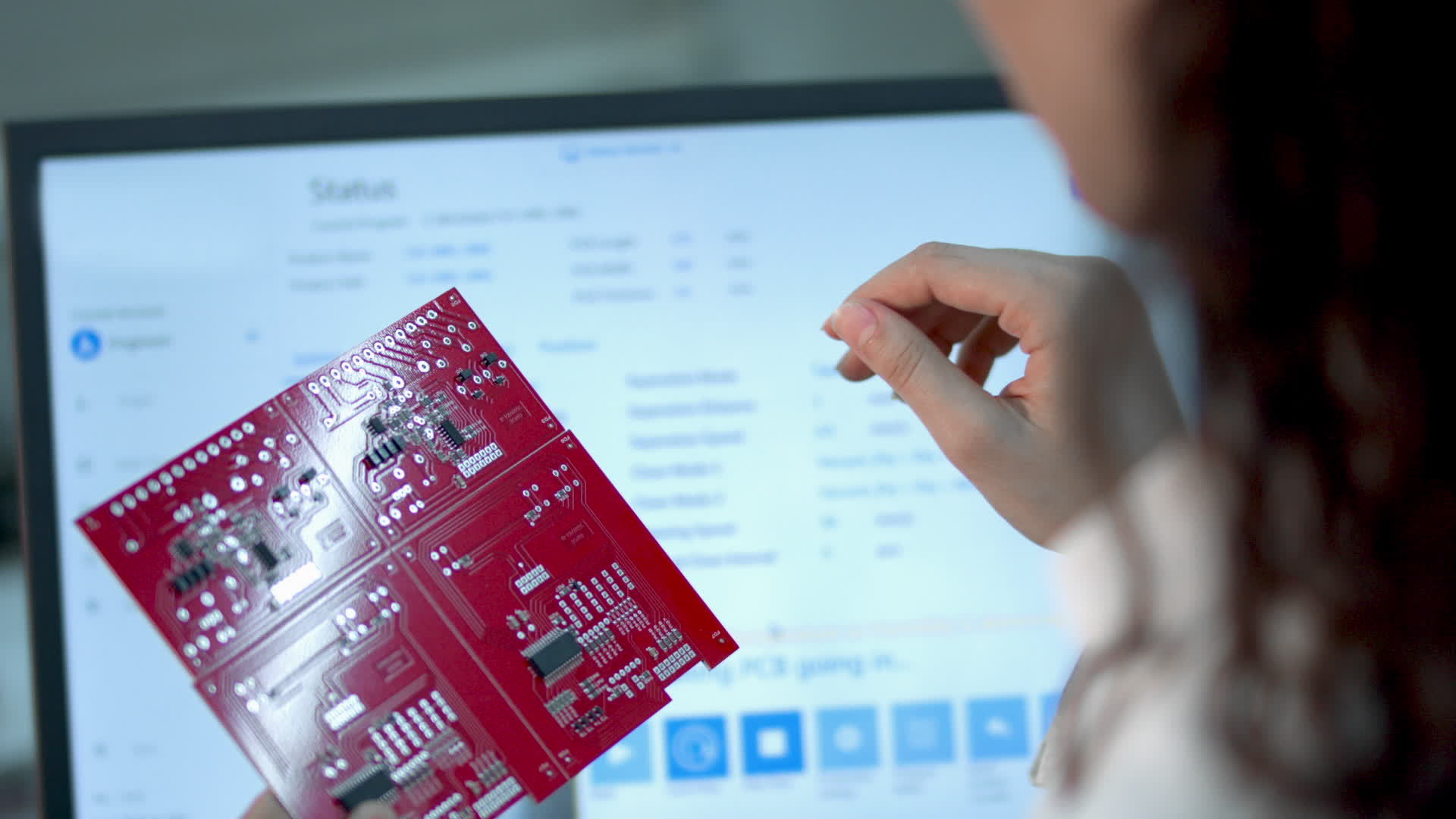 Checking Circuit Board Components. A closeup view of an engineer