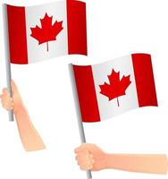 icono de la bandera de canadá en la mano vector