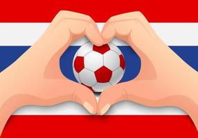 balón de fútbol de tailandia y forma de corazón de mano vector