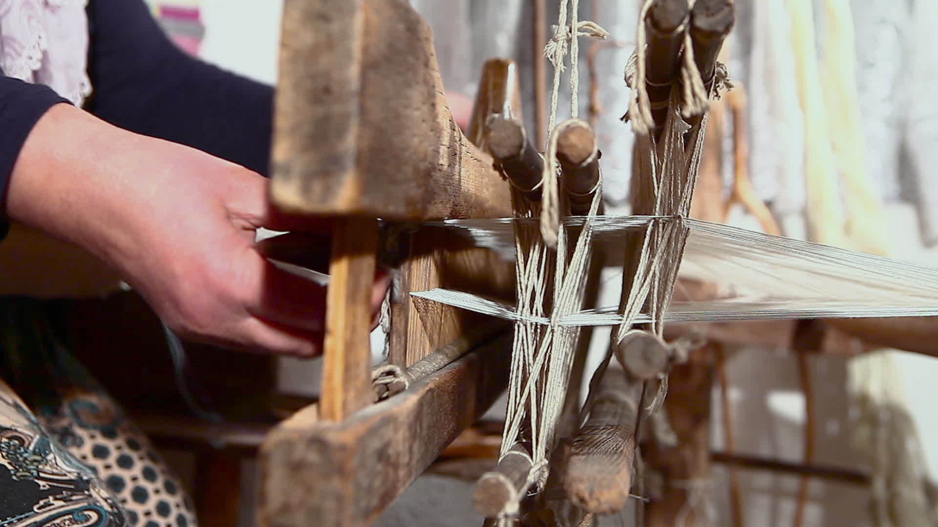 Traditional carpet weaving process. Wool carpet production. Handcrafted