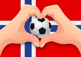 balón de fútbol de noruega y forma de corazón de mano vector