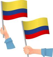 icono de la bandera de colombia en la mano vector