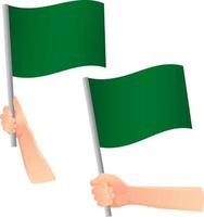 green flag in hand icon vector