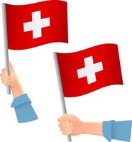 icono de la bandera suiza en la mano vector