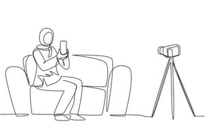 Continuous one line drawing Arab female influencer filming video review smartphone on dslr camera at home. Blogger advertising tech product, streaming live. Single line draw design vector illustration
