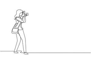 Single continuous line drawing woman photographer holding photo camera and photographing. Creative profession or occupation. Happy female take photo shot. One line draw design vector illustration