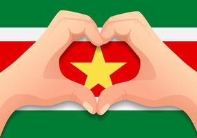 bandera de surinam y forma de corazón de mano vector