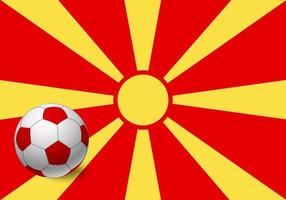 bandera de macedonia y balón de fútbol vector