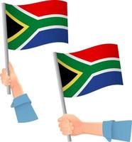 icono de la bandera de Sudáfrica en la mano vector