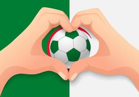 balón de fútbol de Argelia y forma de corazón de mano vector