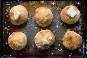 Homemade country biscuits with butter flat lay photo